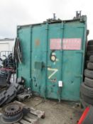 Green steel shipping container, 20 ft. x 8 ft. approx. plus rack and contents of mainly Ford car