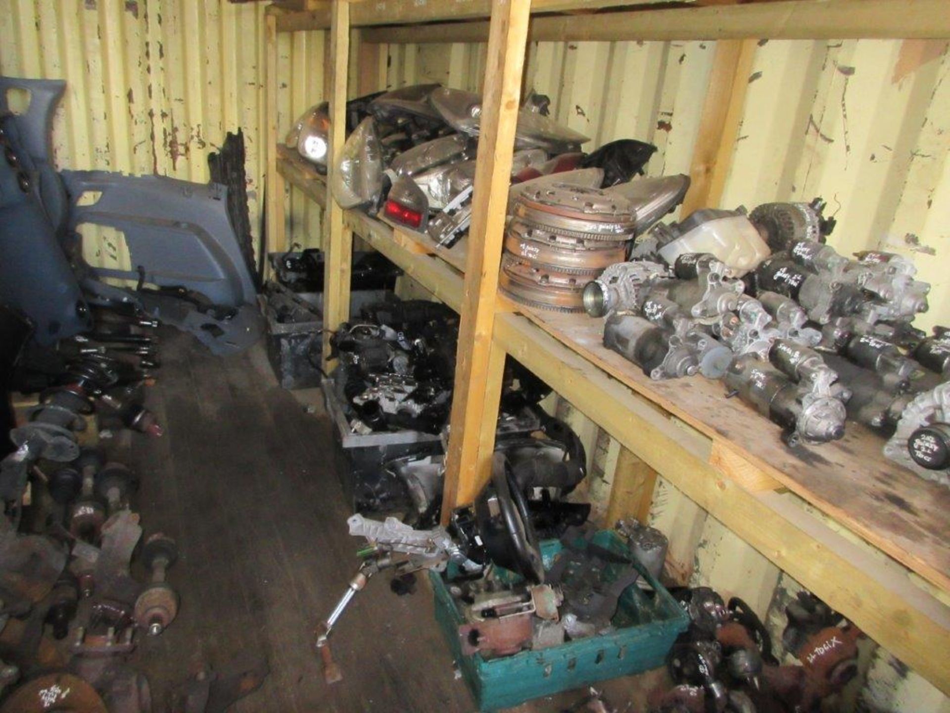 Green steel shipping container, 18 ft. x 8 ft. approx. plus rack and contents of mainly Ford parts - Image 3 of 4