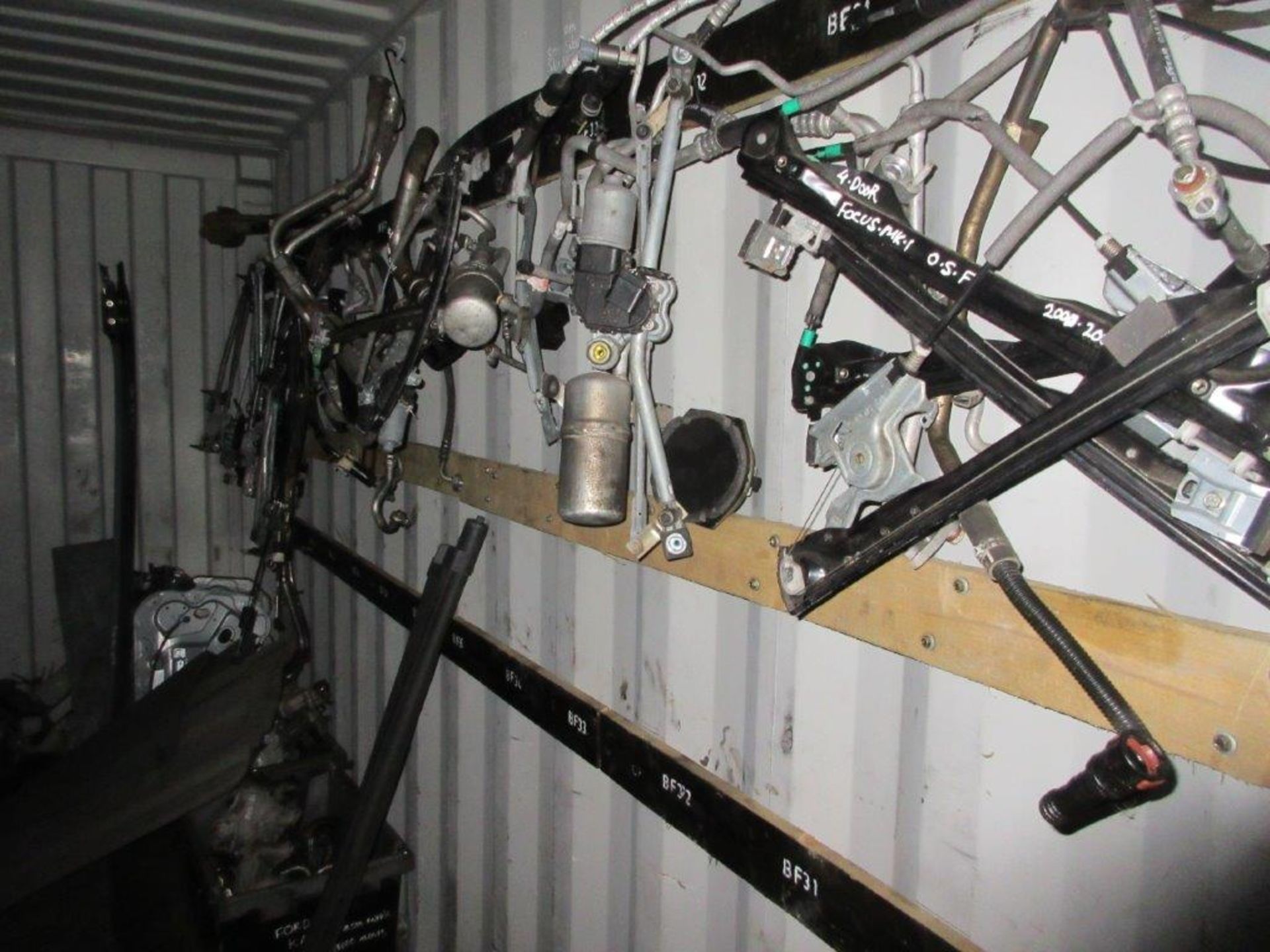 Blue steel shipping container, 40 ft. x 8 ft. approx. plus rack and contents of mainly Ford Focus - Image 7 of 9