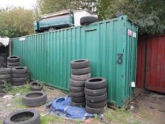 Green steel shipping container, 40 ft. x 8 ft. approx. (Tyres included with Lot 1). *NB: A work
