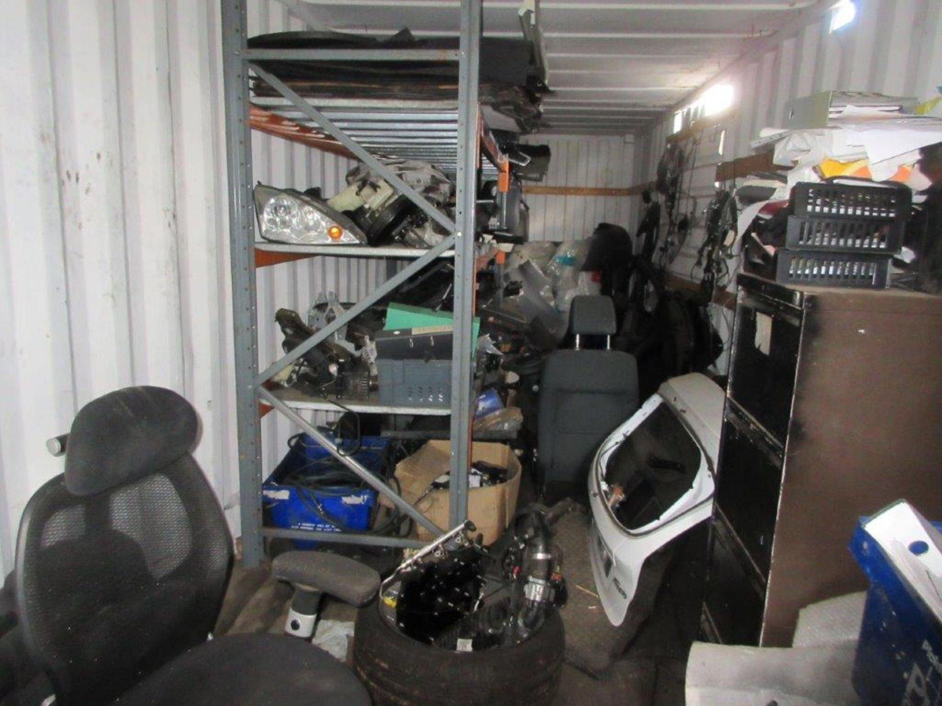 Grey/white steel shipping container, 40 ft. x 8 ft. approx. plus racks and contents including tyres, - Image 3 of 5