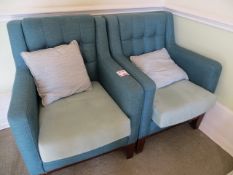 Two matching arm chairs in turquoise cloth