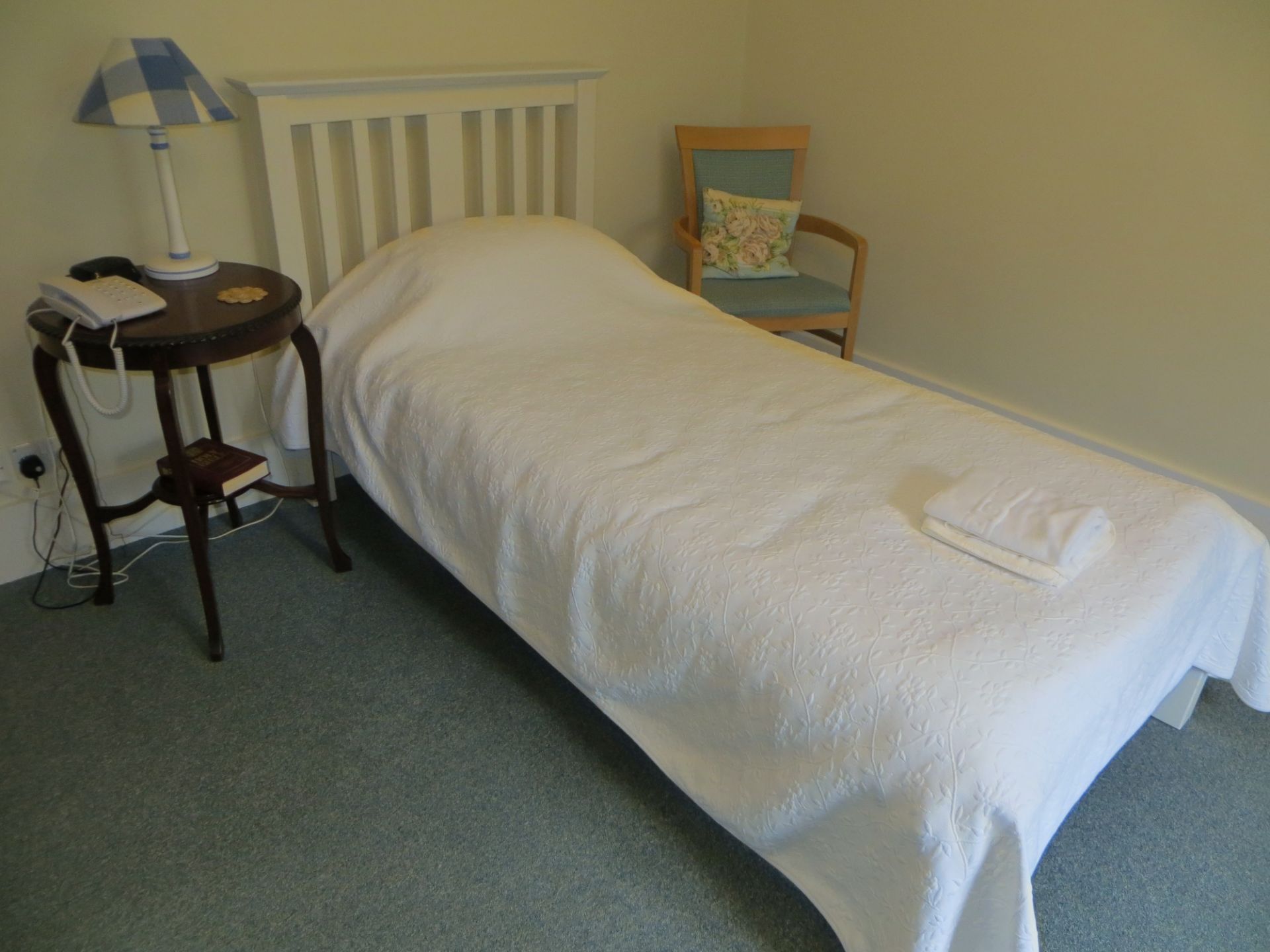 Contents of Corner bedroom to include 3 drawer dark wood bedside chest, dark wood wardrobe, dark