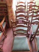 Four matching green cloth dining chairs