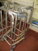 Four Cooper height adjustable mobile walking frames (unused)