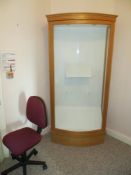 Contents of room to include large illuminated curved glass fronted display unit, desk, swivel & tilt