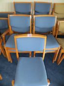 Eleven wooden framed blue cloth stacking chairs blue cloth