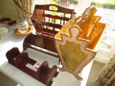 Two newspaper stands, book end stand & book stand