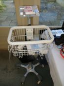 Medical basket trolley & contents to include Seca Scales, Patterson electrical nerve stimulation