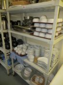 4 tier mobile catering unit and contents to include bread baskets, stainless steel serving trays,