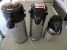 Three various thermos jugs as lotted