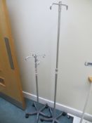 Two unnamed height adjustable mobile drip stands