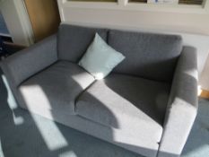 Grey 2 seat cloth sofa along with 2 coffee tables