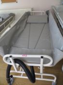 Freeway manual height adjustable shower trolley SWL 200Kg s/n 5005