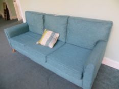 Three seater turquoise cloth sofa