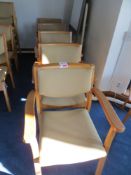 Five wooden framed cream cloth elbow chairs cream cloth