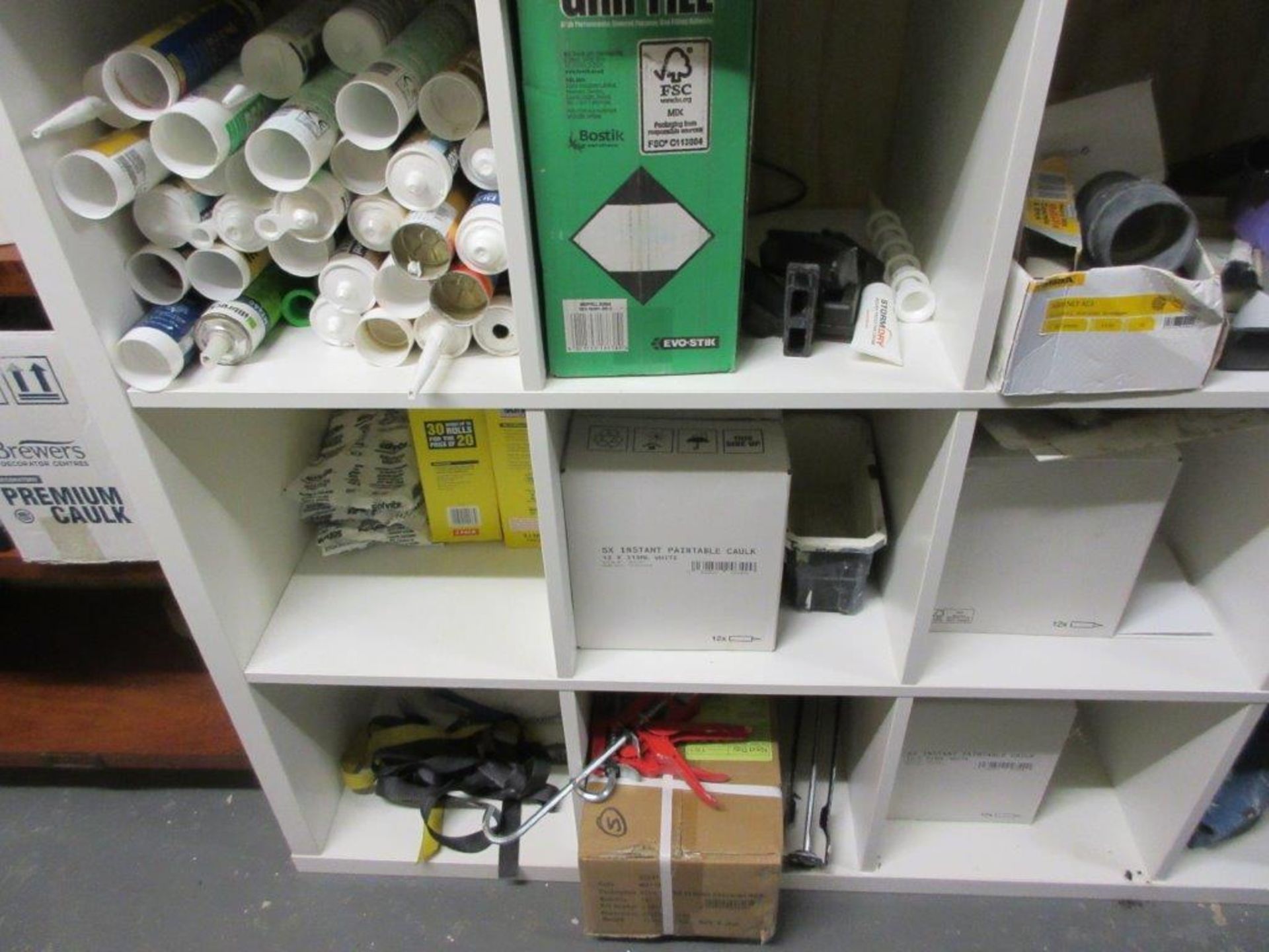 Pigeon hole and wood storage racks c/w contents including sealants, sealant guns, kettles, fire - Image 2 of 9