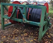 Front / rear mounted hydraulic powered hose reeler with a quantity of hose