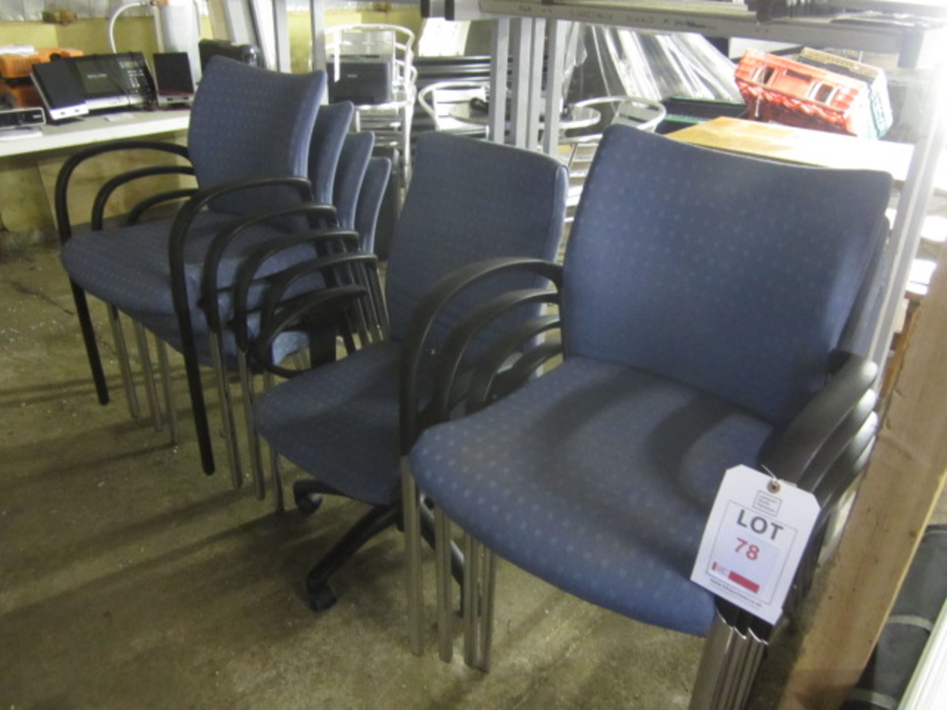 8 x upholstered meeting chairs with 1 x swivel arm chair