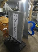 Freestanding helmet display stand, water filled base swing sign