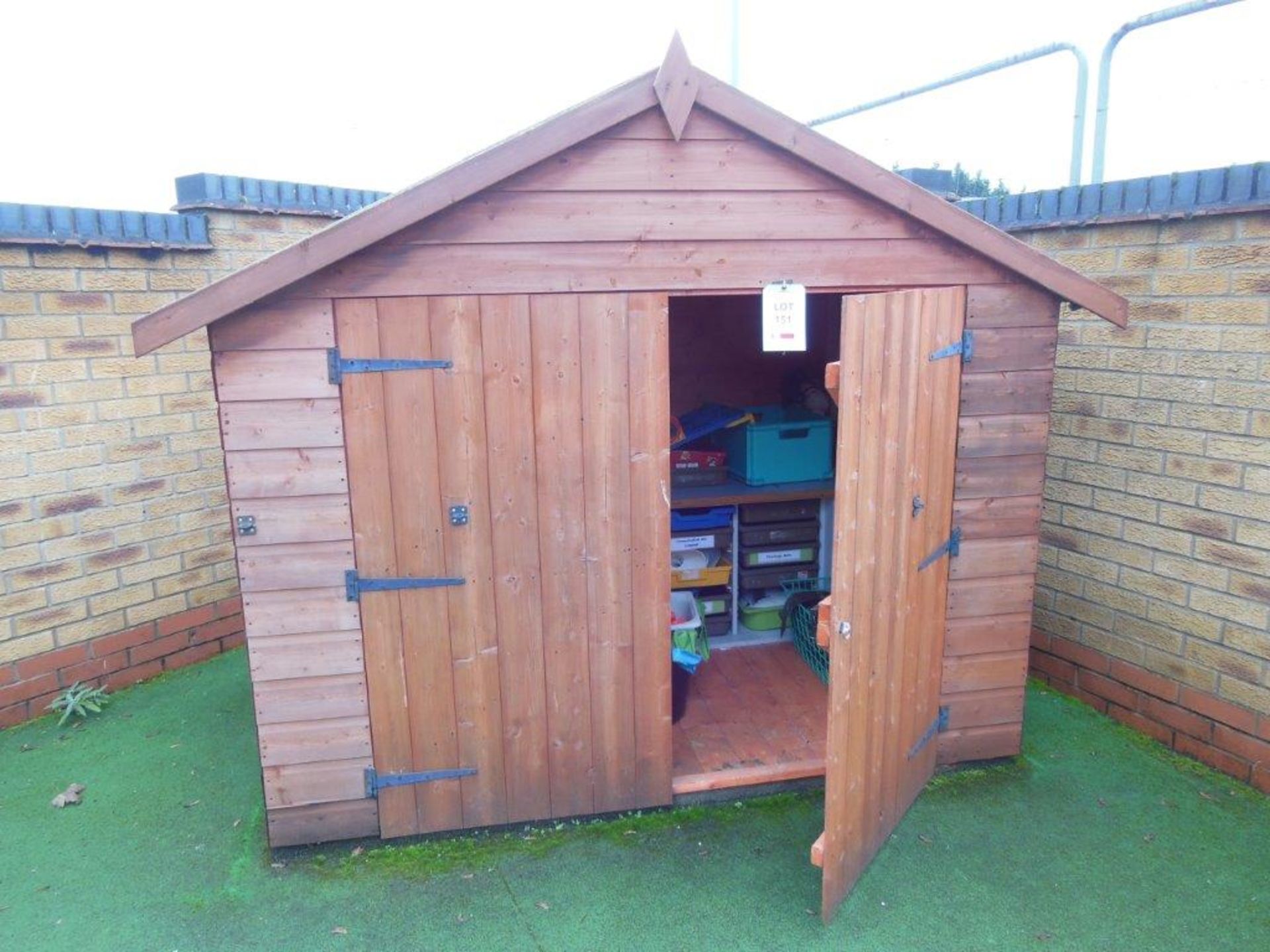 Timber shed and contents including toys and games, shed dimensions: 205x145x185cm to apex. *(Lot
