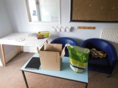 The contents of room including wooden table, 2 blue upholstered tub chairs, 2 brown leather effect