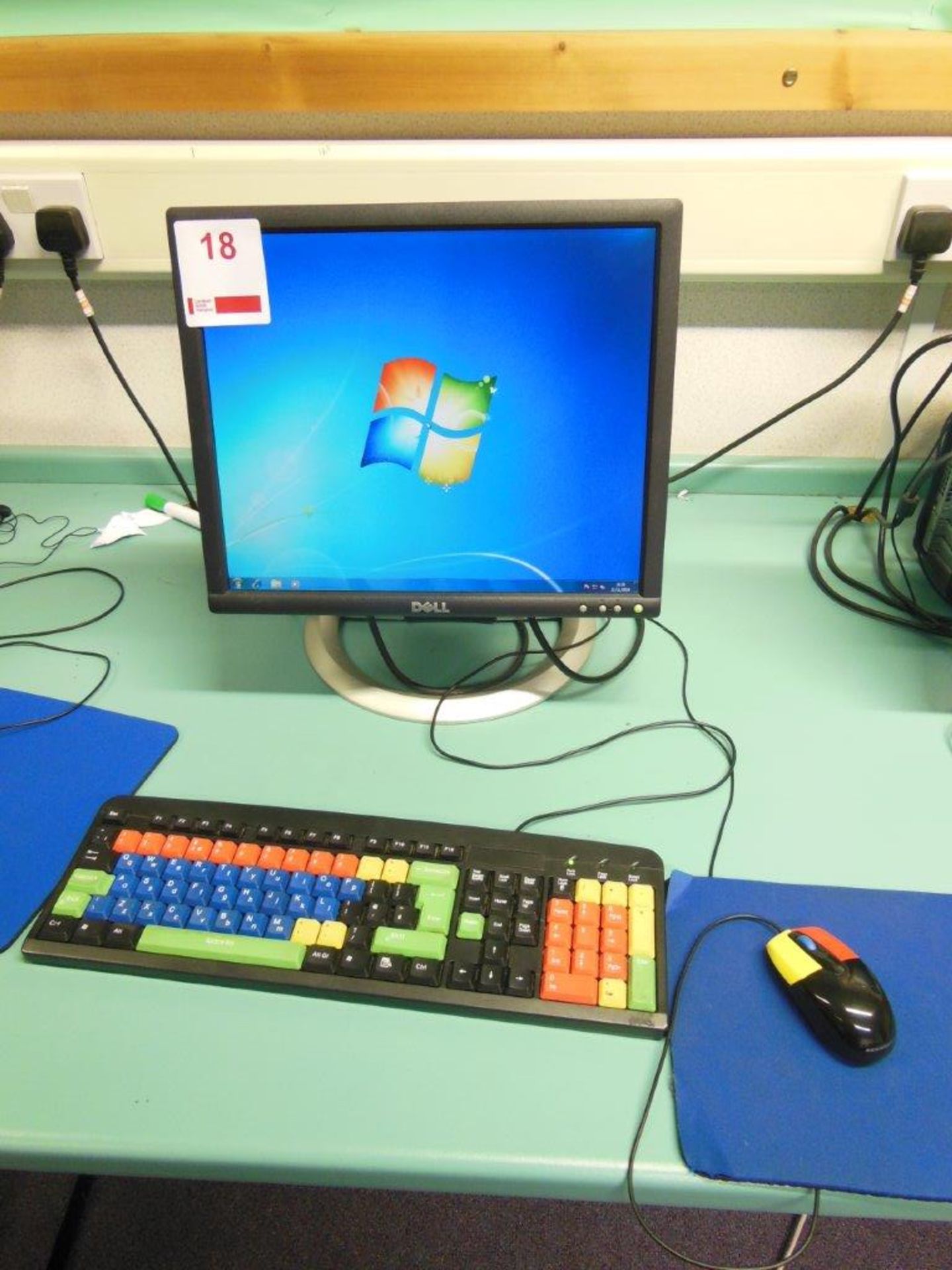 Dell Optiplex 780 desktop computer with flat screen monitor, colour keyboard and mouse incorporating