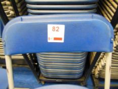 138 approx Samsonite blue folding chairs c/w 3 storage trolleys, seat height 45cm. *(Lot located: