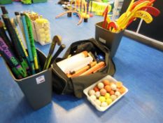 Quantity of indoor and outdoor hockey equipment including sticks, balls and a set of hockey