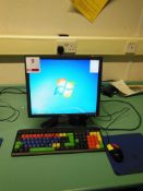 Dell Optiplex 780 desktop computer with flat screen monitor, colour keyboard and mouse incorporating