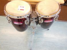 Pair of percussion plus bongo drums on stand. *(Lot located: Milverton Prep School, Park Street,