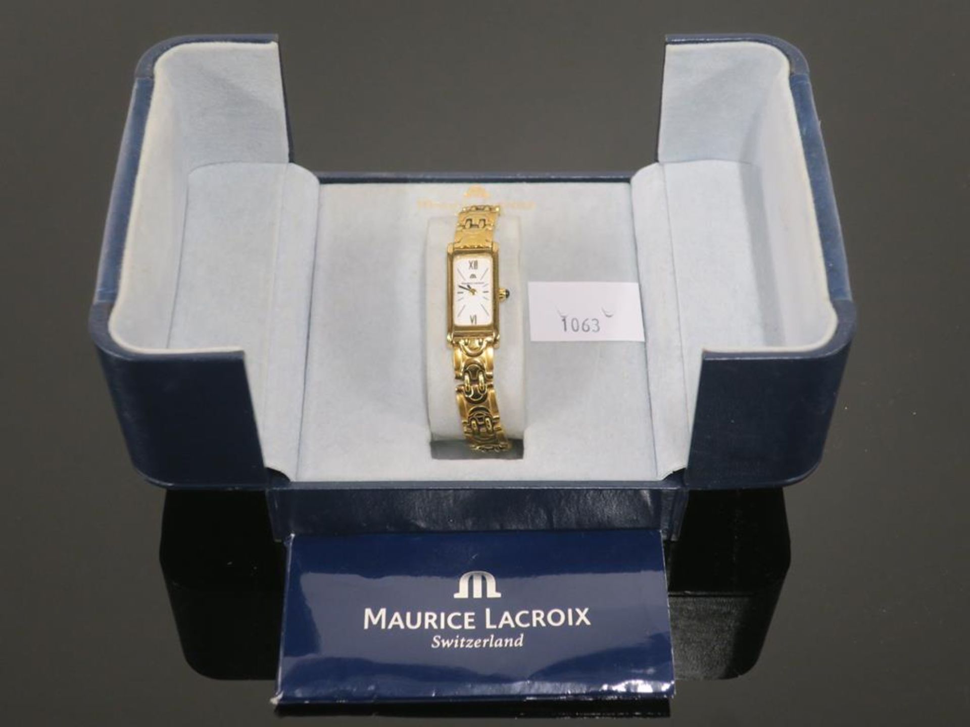 A boxed Maurice Lacroix Swiss made Gold Plated Ladies Watch (est £80-£100)