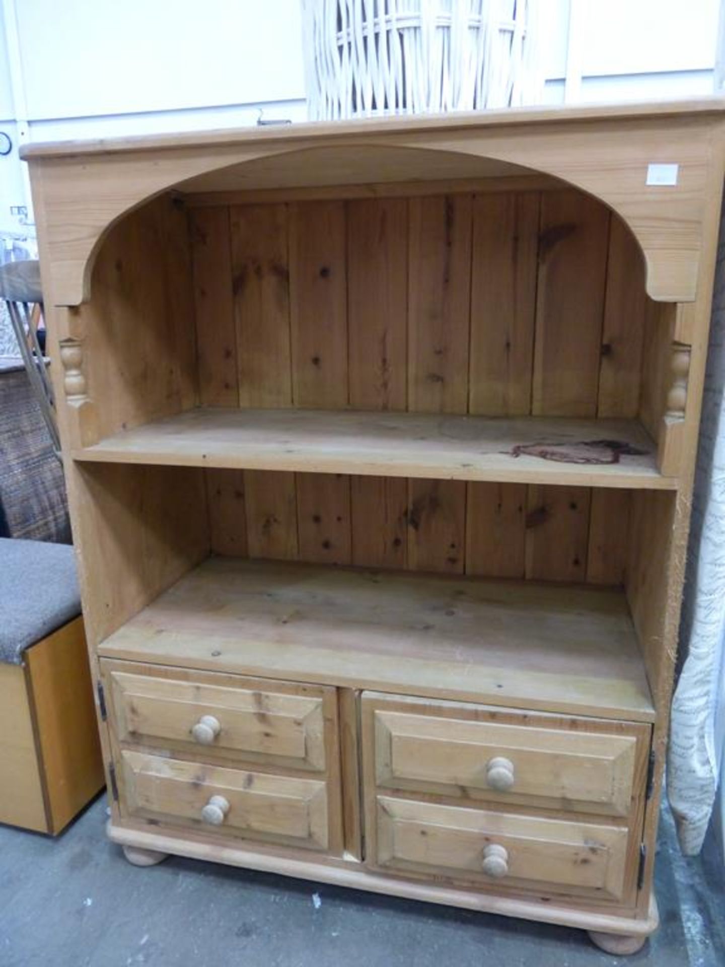 A stripped pine Open Storage Cupboard with cupboards to the base (91cm) (est £30-£50)