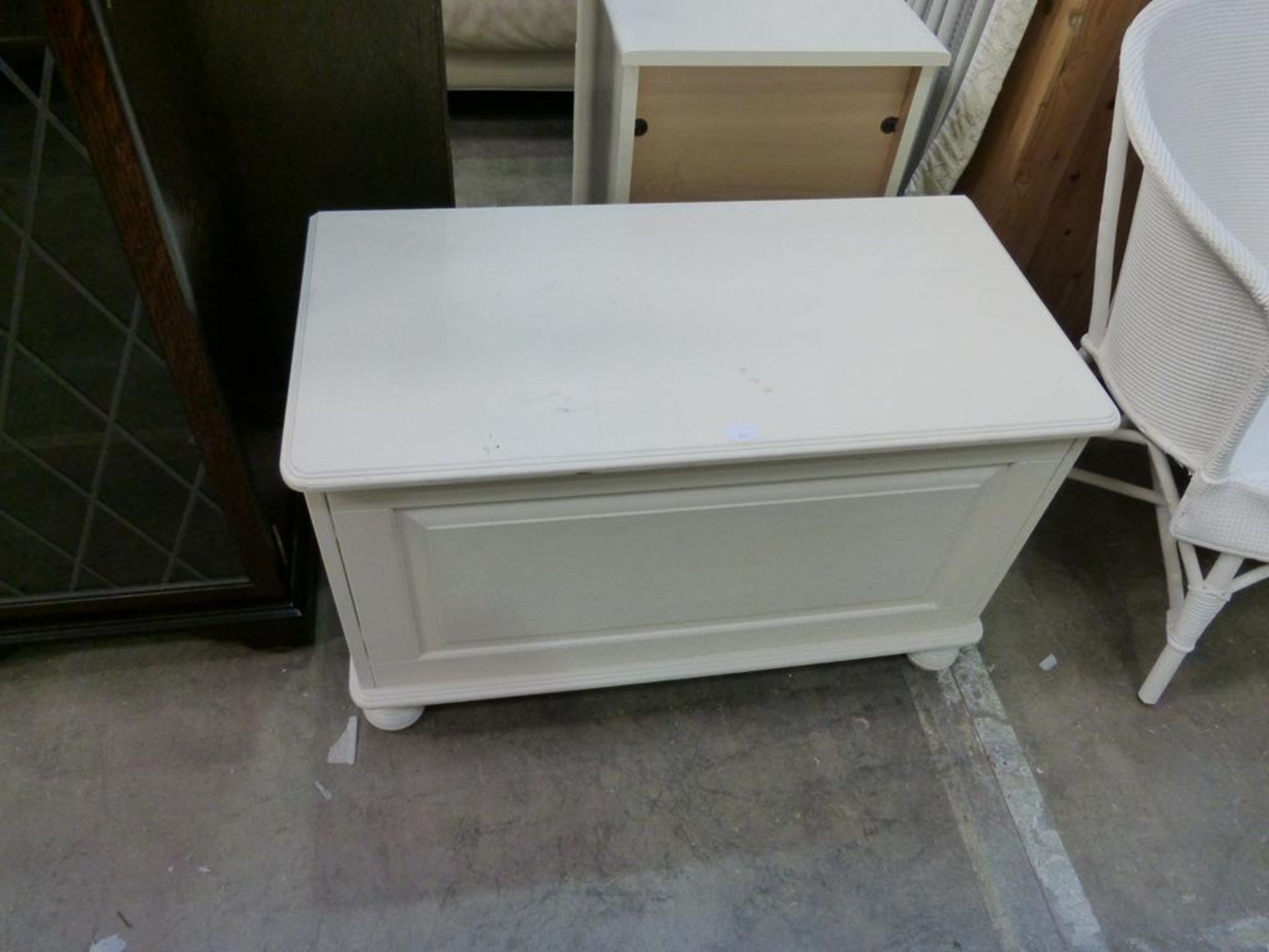 A white painted pine Blanket Box, a modern white finish three drawer Bedside Chest, an Ironing Board