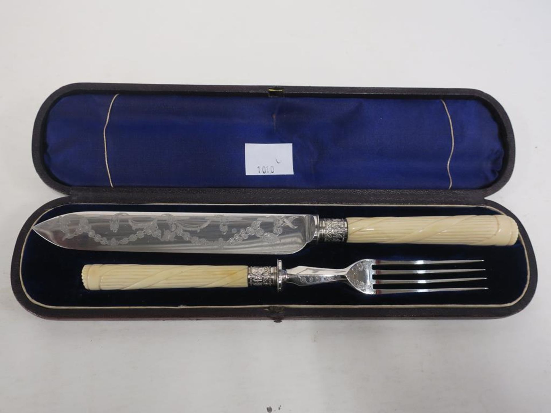 A Victorian Silver Plated Carved Bone Handled Carving Set (pair) in fitted case c 1880 (est £30-£