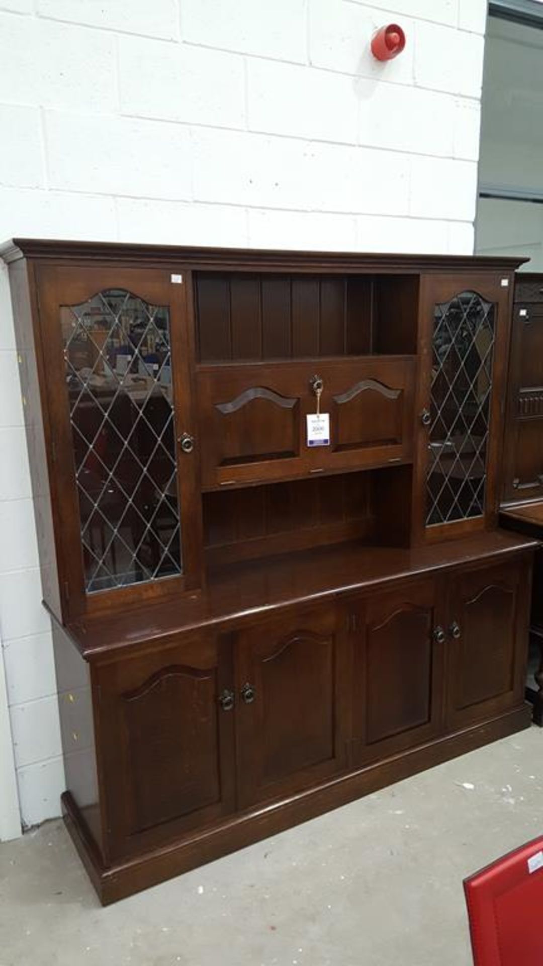 A Tall Wall Display Unit with seven doors (H 187cm, W 183cm, D 46cm) (est £30-£60)