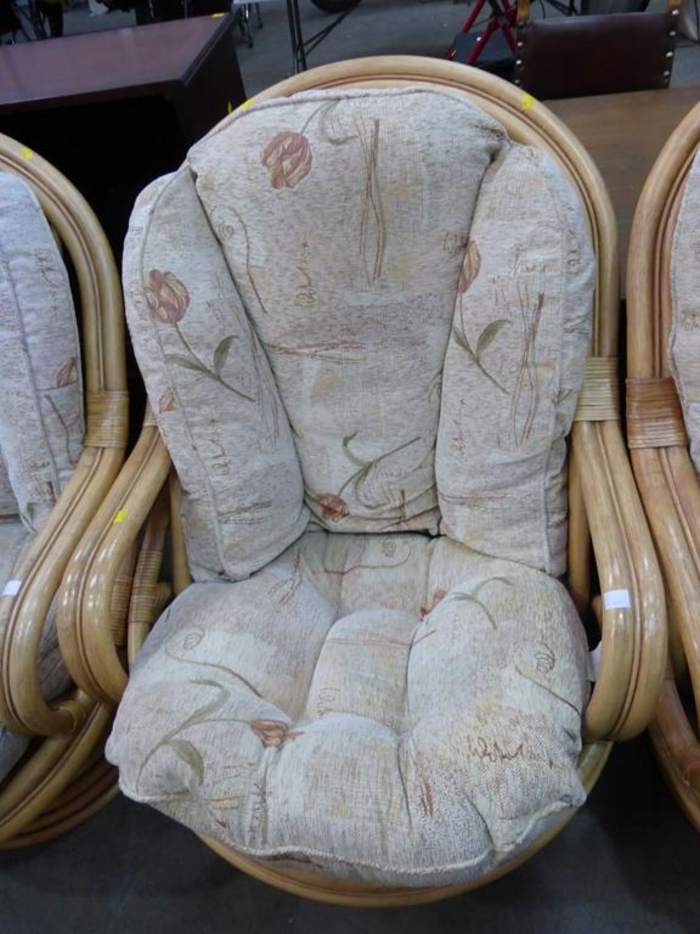 A set of three large cane framed Swivel Conservatory Armchairs each with loose cushions (est £ - Image 2 of 2