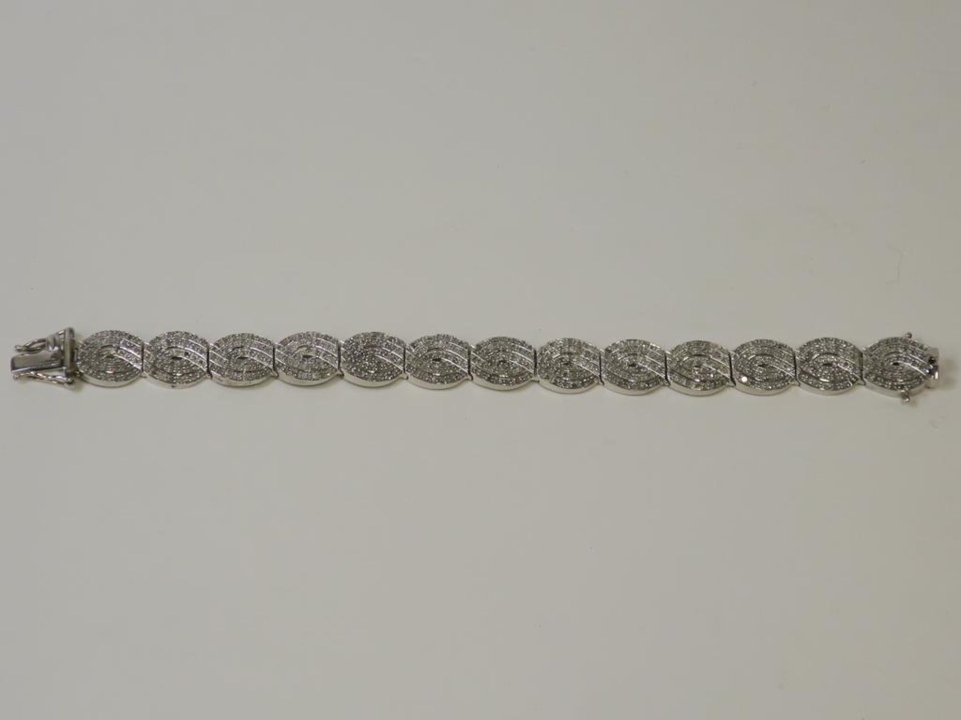 A Multi Diamond Encrusted Bracelet (approx 460 diamonds - approx 4.5 carats total) (est £200-£400)