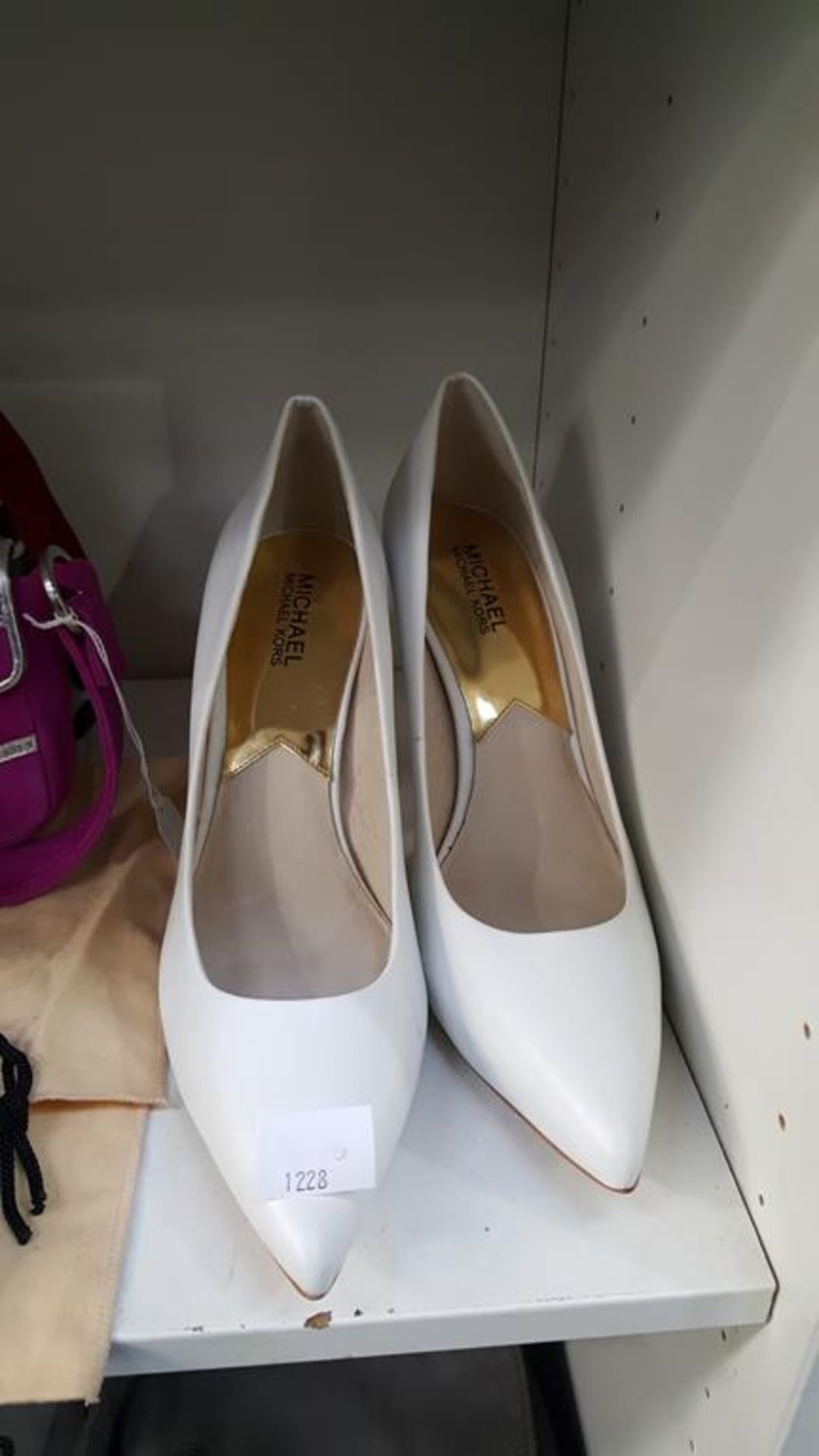 Three shelves containing a Pair of Michael Kors White Shoes (size 9½), Upla, Patrick Cox,