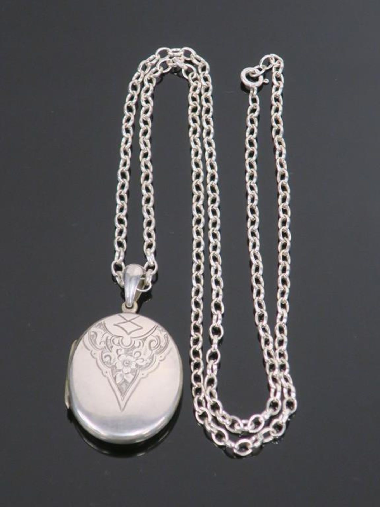 A Victorian Locket (tests as Silver Back and Front) on Later Chain, marked '925' and Tests as Silver