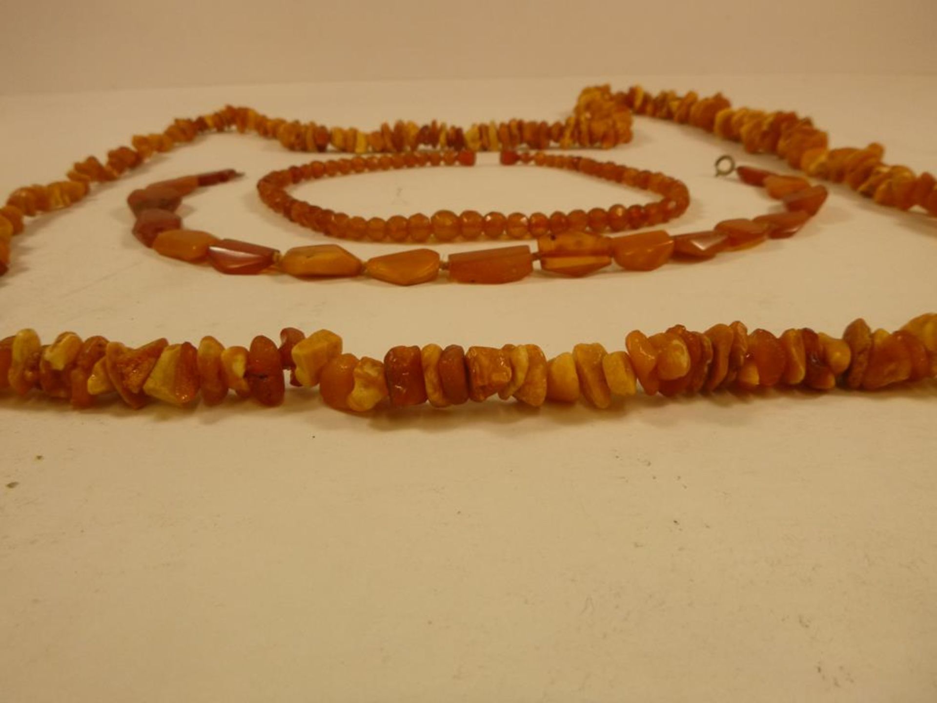 Three Strings of Natural Amber Beads (approx 160g) (est £45-£90) - Bild 2 aus 2