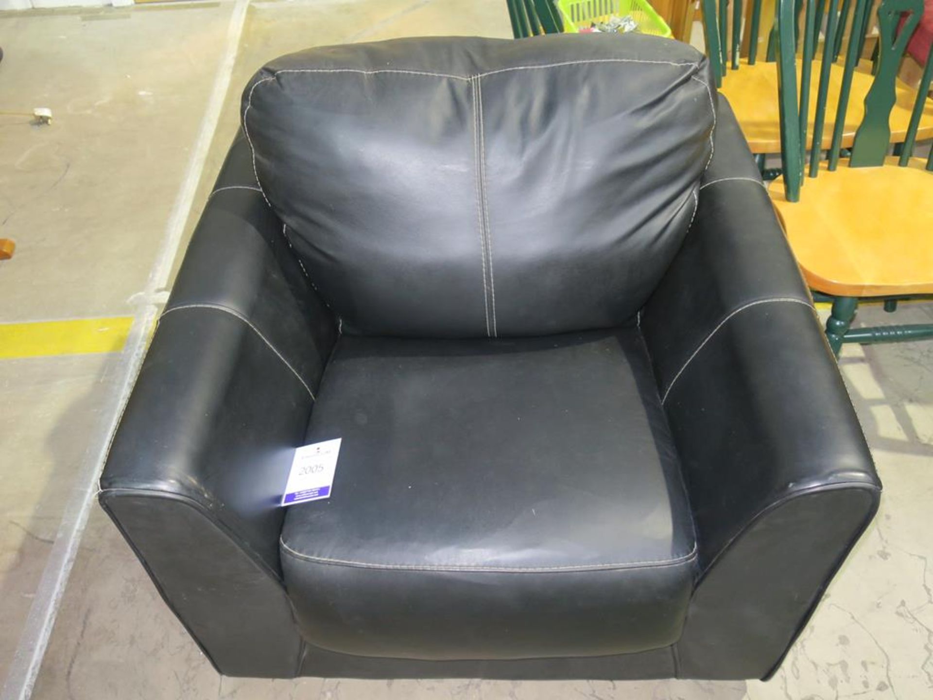 * A Black Leather Single Seater with White Stitching (est £25-£50)