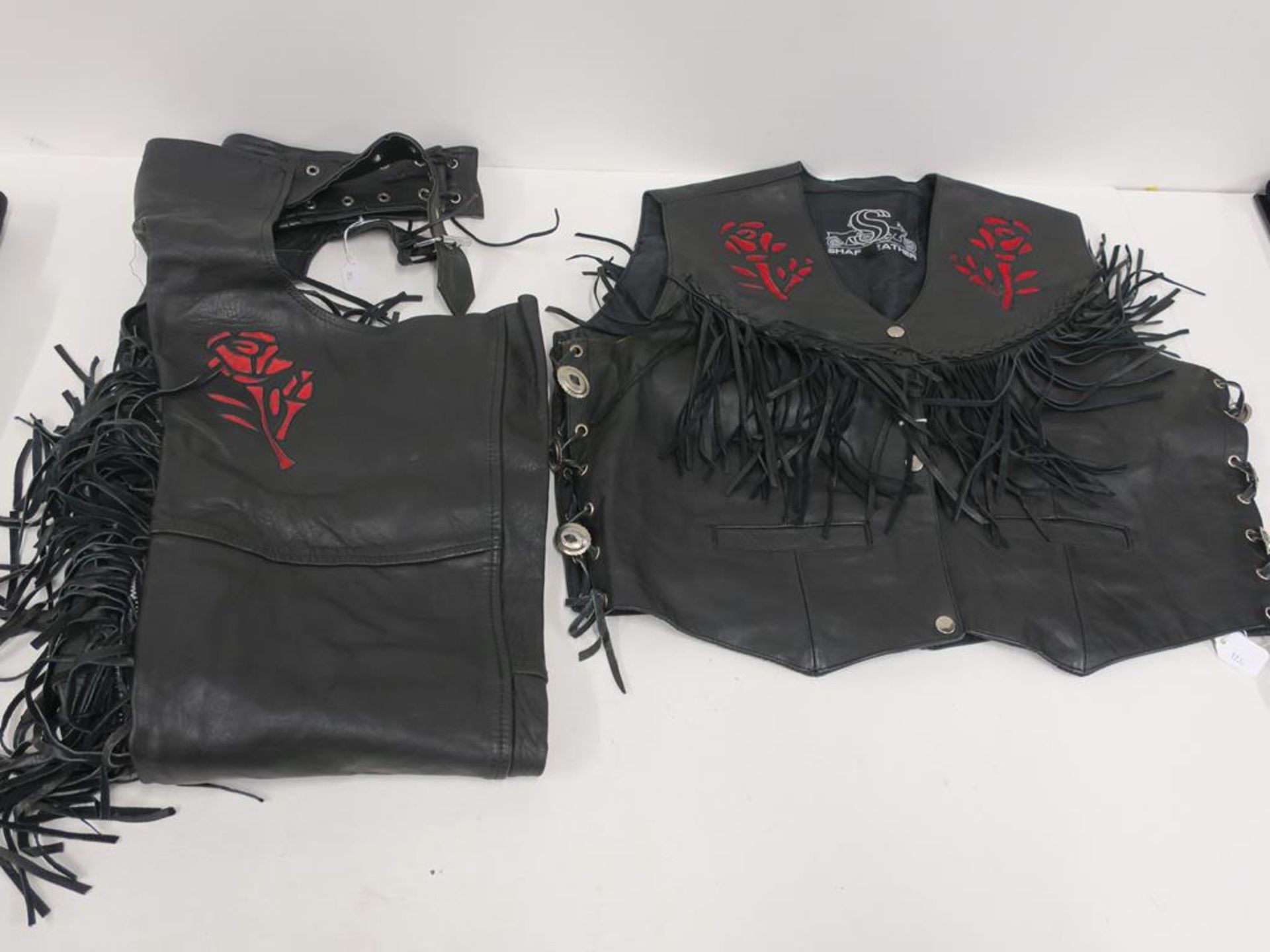 A pair of Harley Davidson (?) Leather Sheen Chaps and Shaf Leather Waistcoat (2) (est £50-£70)
