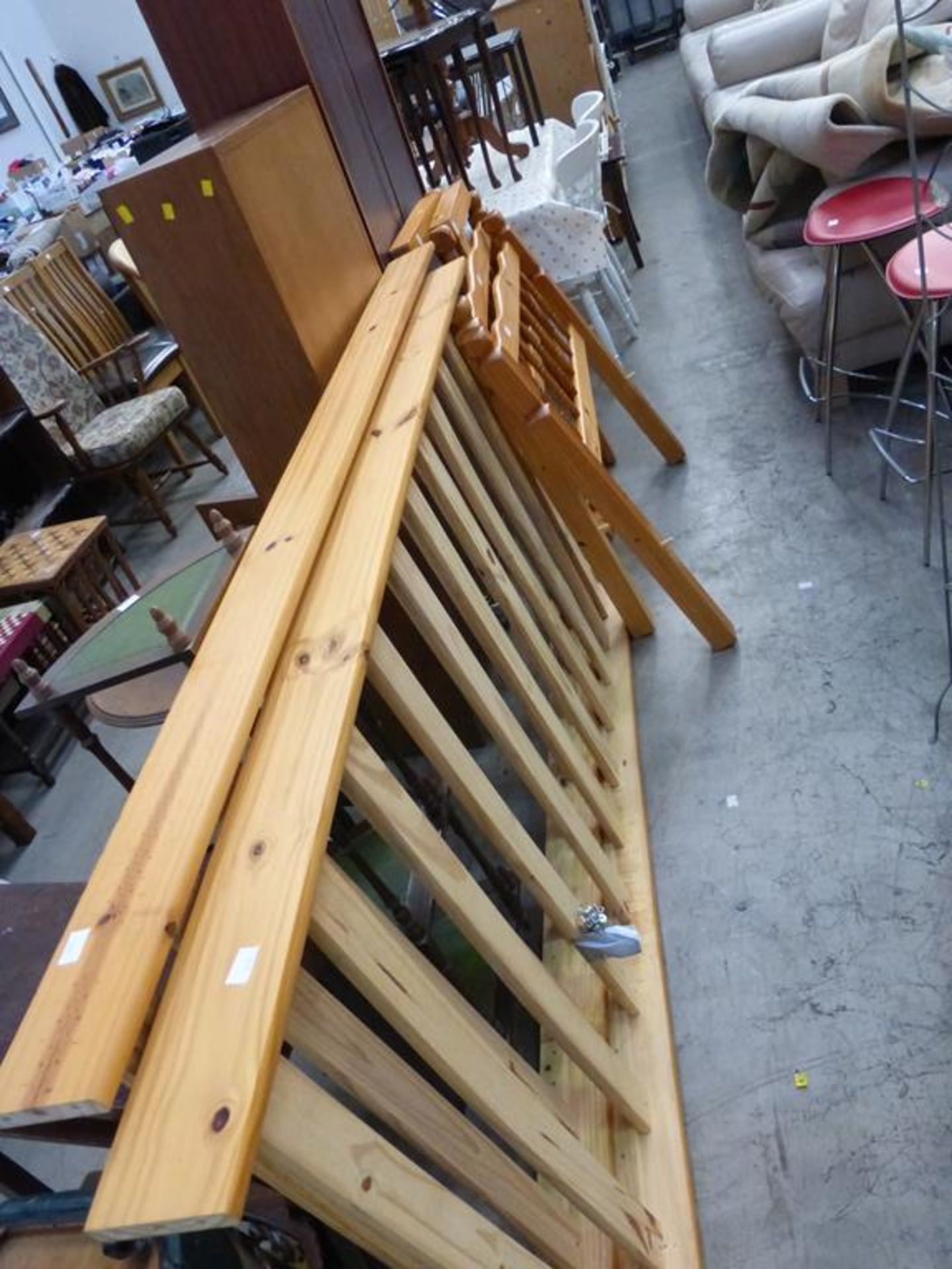 A pair of modern pine Single Bed Frames (est £40-£60)