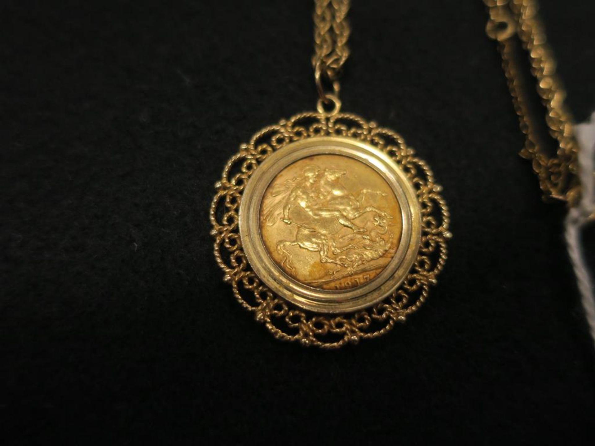A George V 1917 Full Sovereign Loosely Mounted as a Pendant on a 9ct Gold Chain. Total Weight ( - Image 2 of 3