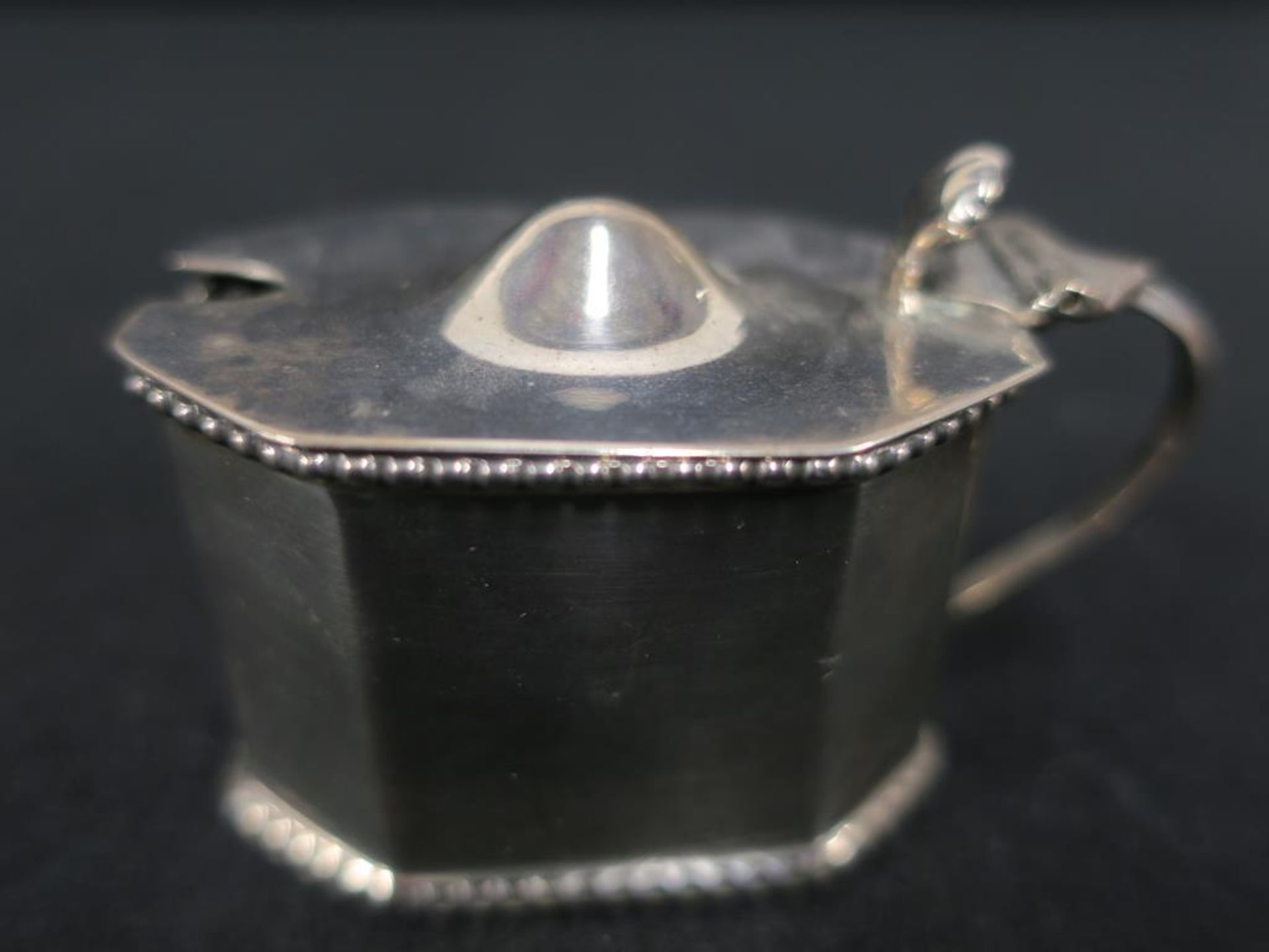 A Hallmarked Silver Salt or Condiment Pot with hinged lid and blue glass liner (est £20-£40)
