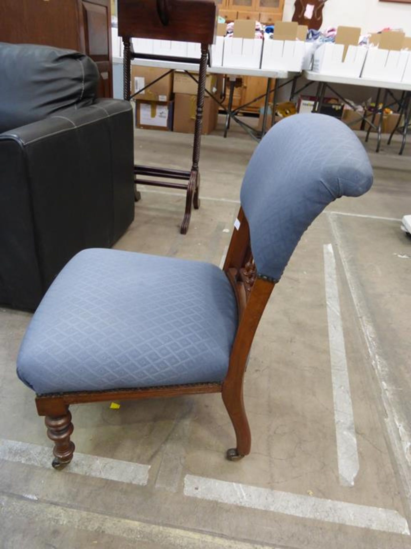 A Late Victorian Walnut Nursing Chair with upholstered back and seat on turned front legs (est £ - Image 3 of 3