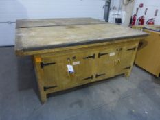 A Large and Substantial Ex School Woodworking Bench. The Bench is fitted with Two Pairs of Doors