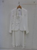 * Three Ladies Garments to include examples by Condici (size 12, RRP £499), Veni Infantino (size 12,