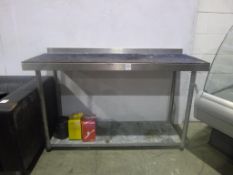 * A Stainless Steel Preparation Table with Splash Back (Carpeted)